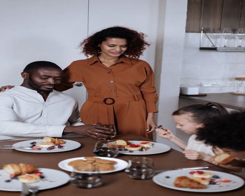 Indian family enjoying a healthy morning breakfast together